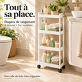 Étagère blanche de rangement à quatre niveaux sur roulettes dans une salle de bain